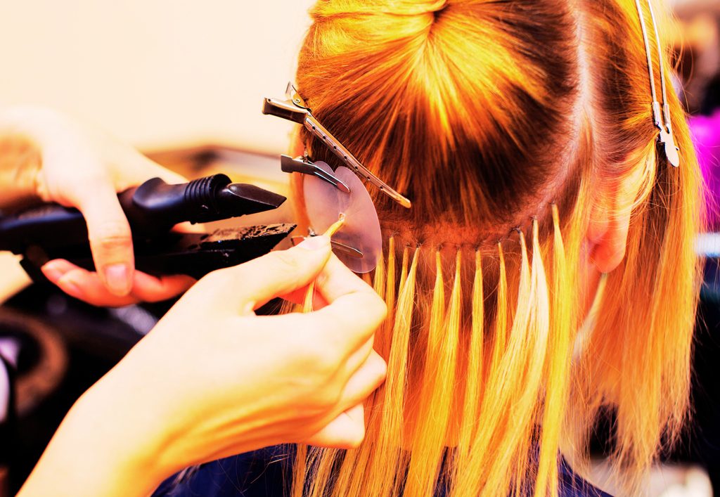 Hair extensions service at Backstage Hair Salon in Oakville